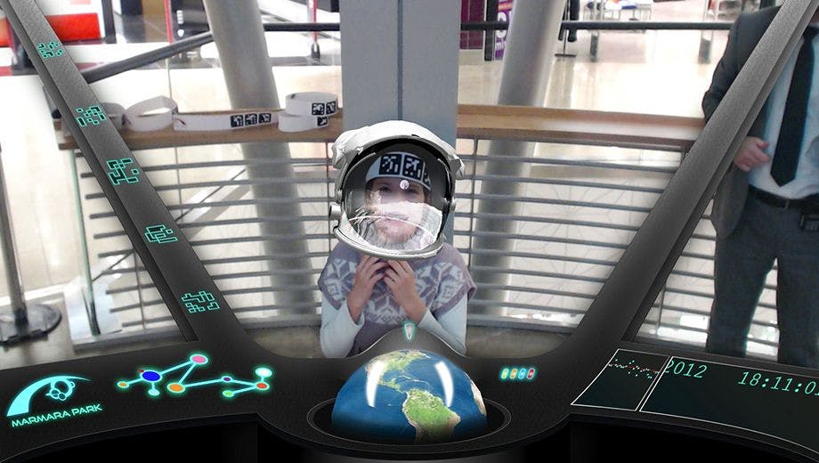 Child wearing virtual astronaut helmet